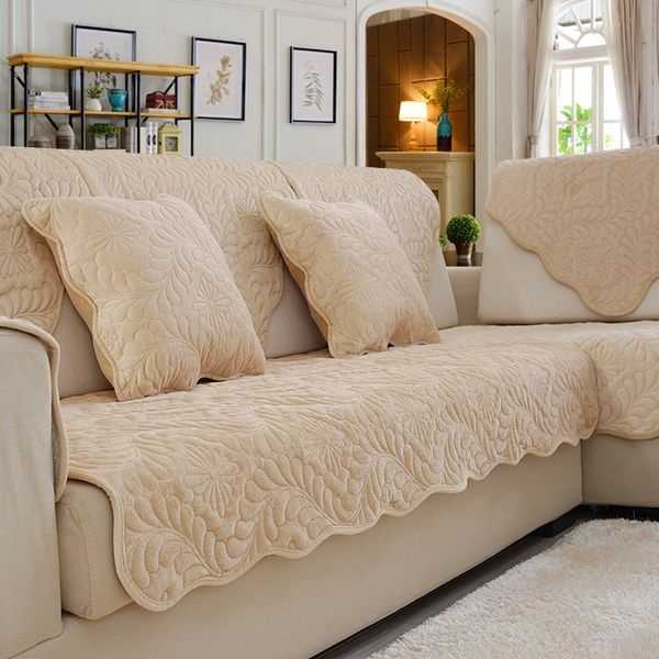 Накидки на диван для украшения и защиты мебели: 20 уютных идей (фото)
