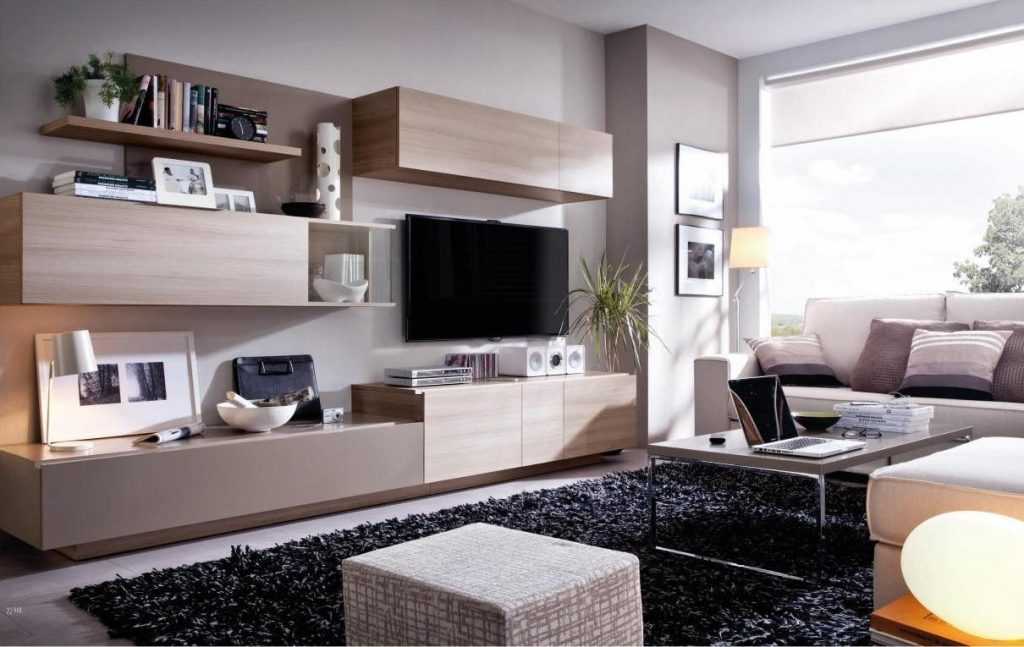 Современные стильные черные диваны в интерьере гостиной квартиры и частного дома Новинки дизайна и оригинальные варианты обустройства темные диваны фото
