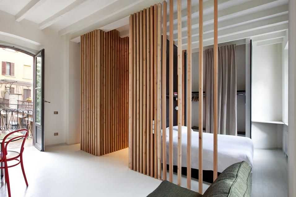 Перегородки для зонирования пространства в комнате, зонирование с помощью стеллажей раздвижные в гостиную и спальню фото 2021 года